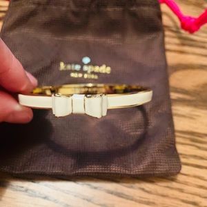 Kate Spade cream enable gold bow bangle